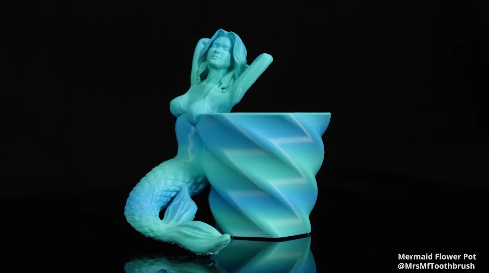 3D printed mermaid flower pot model showing blue gradient layers using Bambu Lab PLA Basic Gradient filament