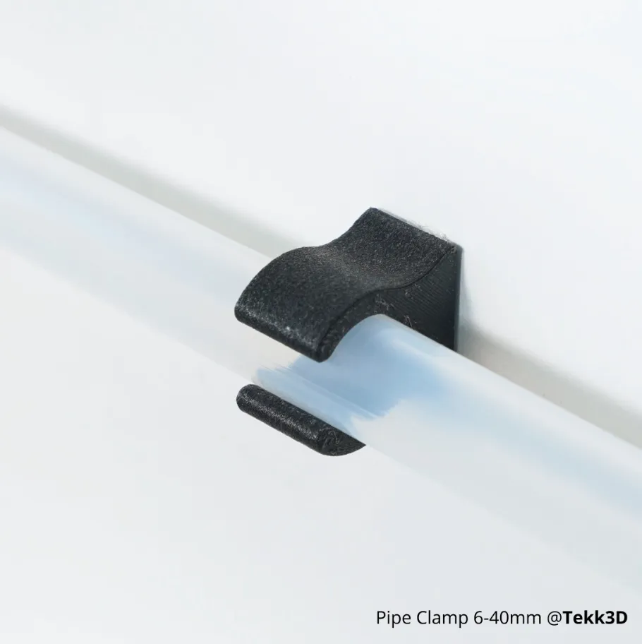 small pipe clamp for holding plastic tube 3D printed with Bambu Lab ABS-GF filament
