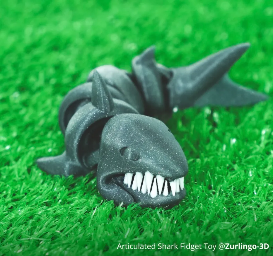 articulated shark fidget toy 3D printed using Bambu PLA Spark filament with glitter finish