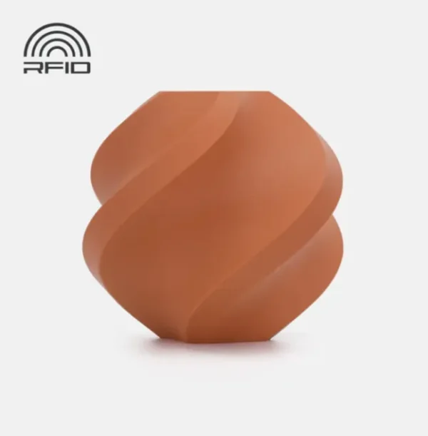 Bambu Lab Matte Terracotta Red Spiral Geometric Sample – Color Code 11203 Spiral geometric 3D printed sample in matte terracotta red with smooth curved surfaces and soft earthy tone