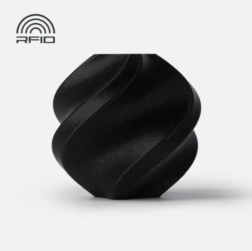 3D printed spiral vase sample made with Bambu Lab PLA Onyx Black Sparkle Filament 1kg featuring a subtle glitter finish and RFID compatible spool, Color Code 13101