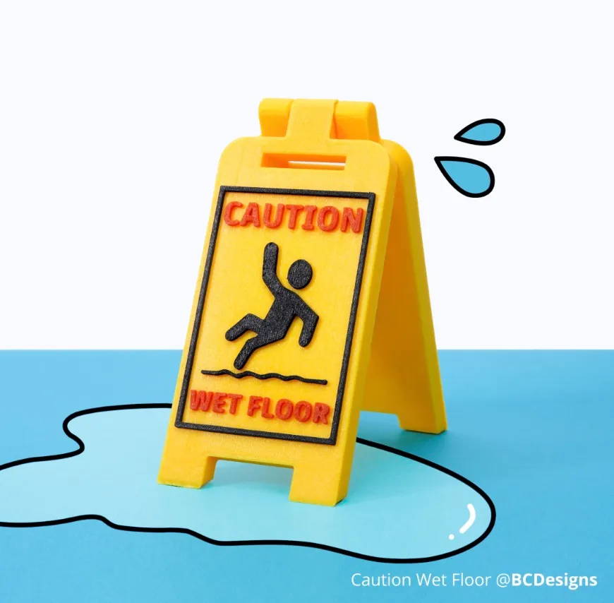 caution wet floor warning sign printed with Bambu Lab PA6-GF Filament showing detailed multi-color print