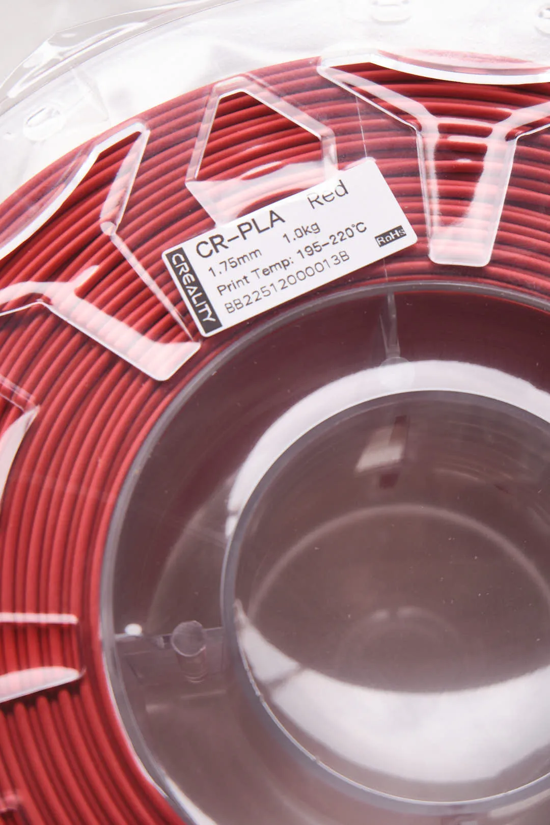 label on Creality CR-PLA Carbon Red filament 1.75mm 1kg showing 1.75mm diameter and 195-220C print temp