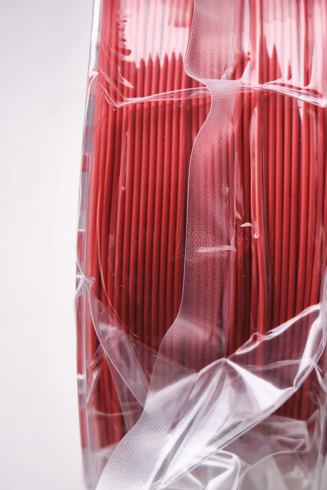 Creality CR-PLA Carbon Red filament 1.75mm 1kg inside clear vacuum sealed bag with strap