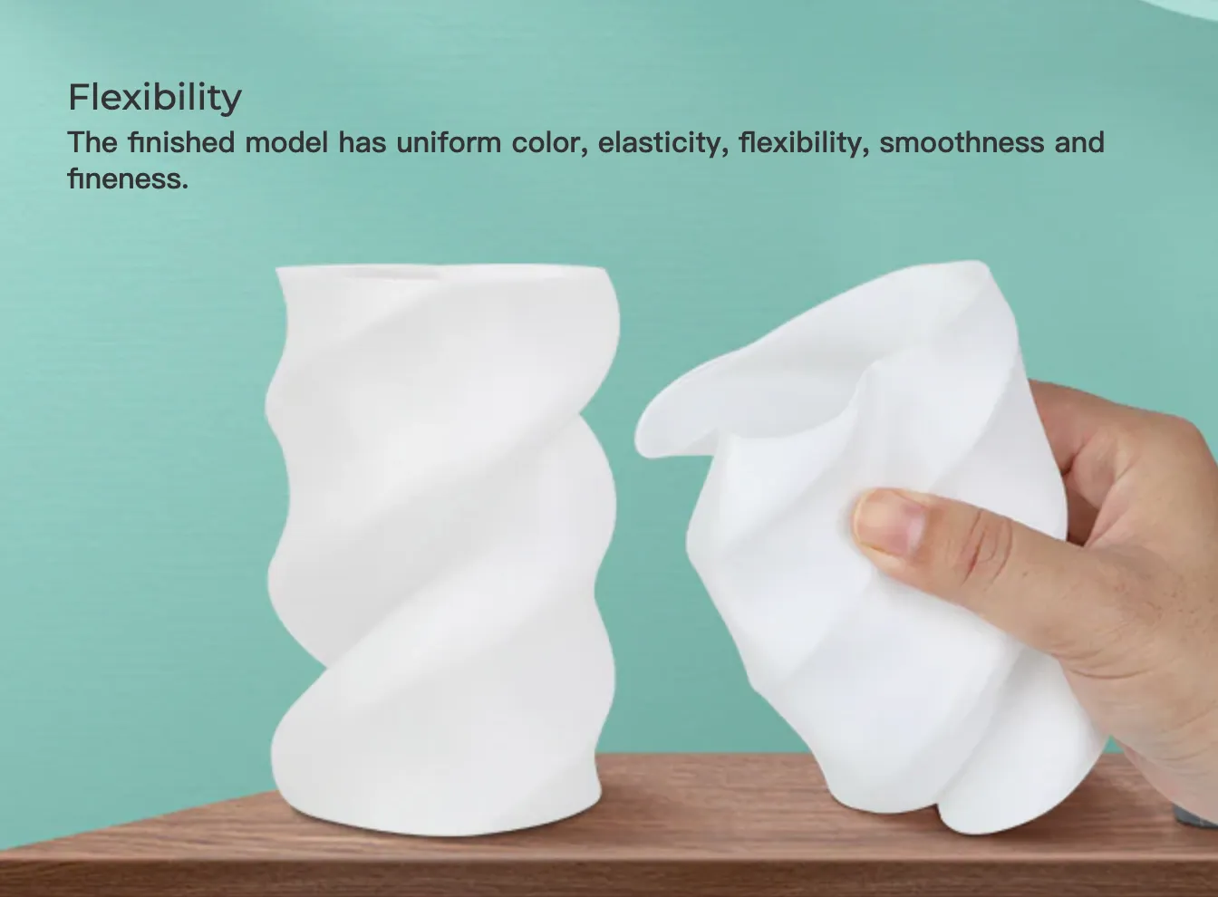 hand squeezing flexible white 3D printed model made with Creality CR TPU filament showing elasticity and softness