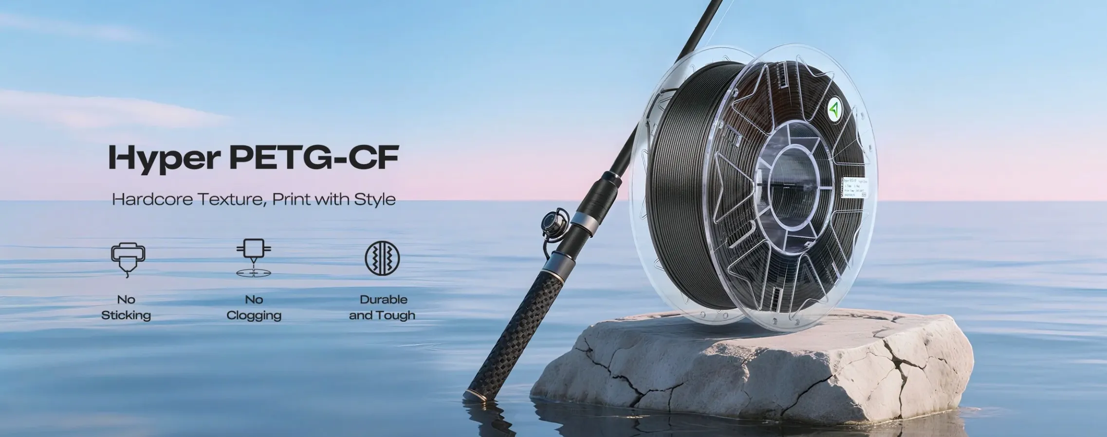 Creality Hyper PETG-CF filament spool placed on rock by the sea with fishing rod showing durability and outdoor use