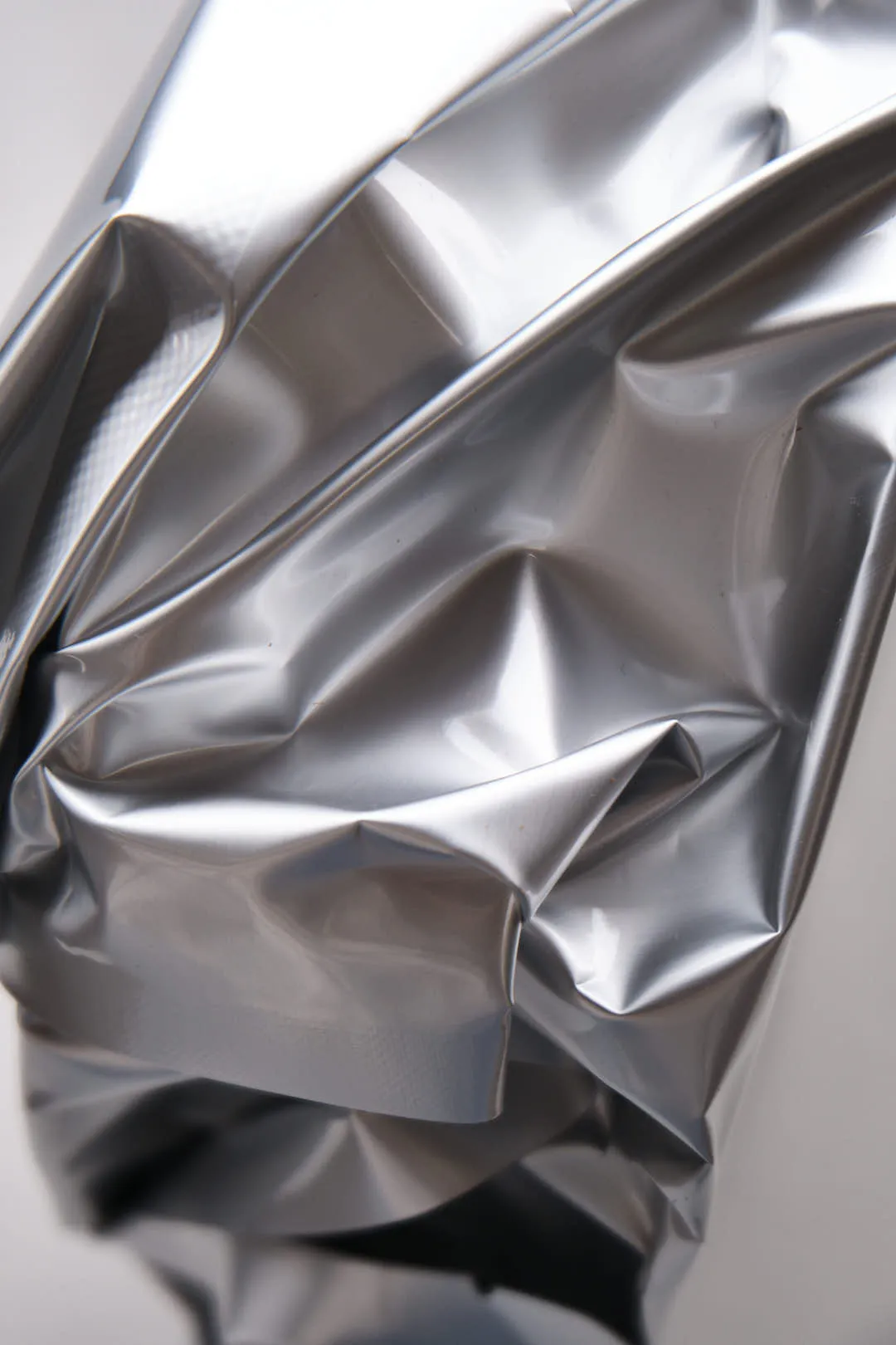Close up of silver vacuum packaging bag used for Creality Hyper PLA RFID filament