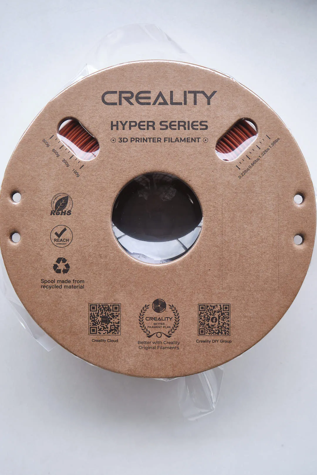 Front view of Creality Hyper Series PLA Brown filament spool with cardboard reel and Creality branding