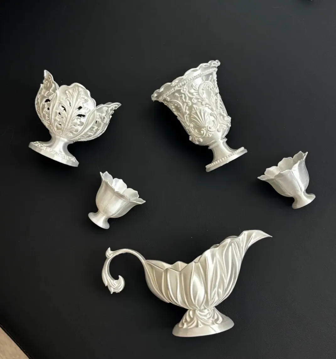 Decorative miniature vessels printed using Bambu Lab PLA Silk+ White Filament 1.75mm 1kg/Spool Color Code 13110