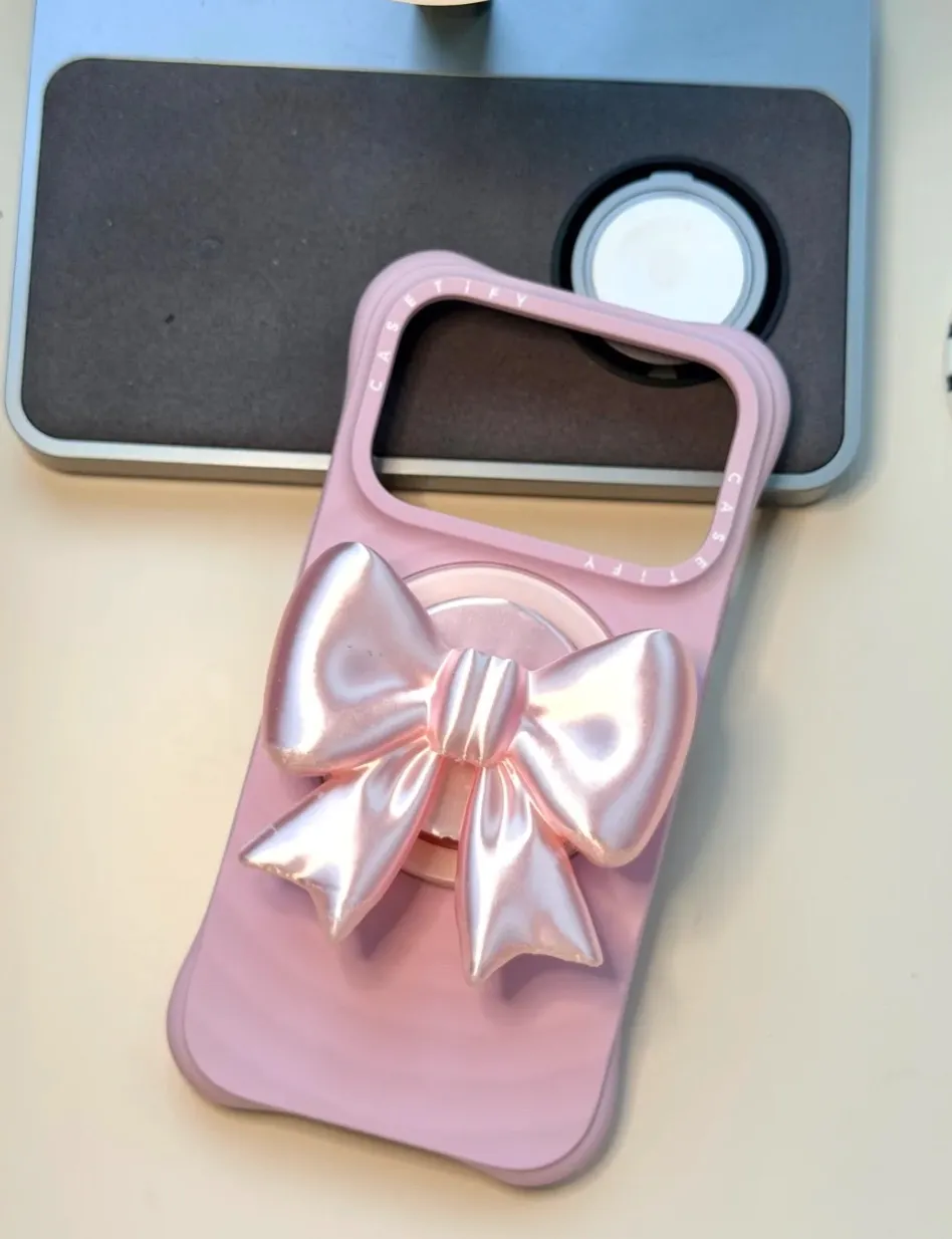 Pink decorative bow accessory printed with Bambu Lab PLA Silk+ Pink Filament 1.75mm 1kg/Spool Color Code 13207 attached to phone case