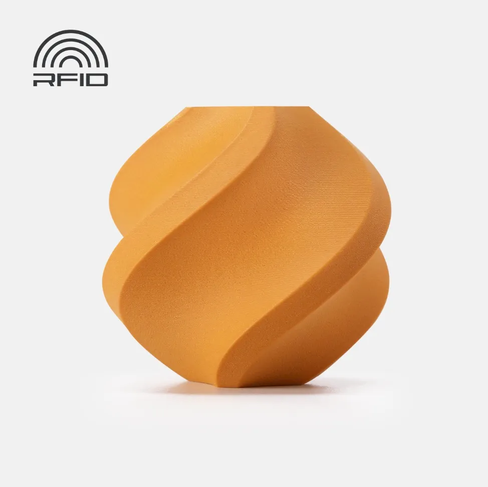 Decorative spiral container 3D printed using Bambu Lab PLA Wood Ochre Yellow Filament with Spool (Color Code 13403) showing matte ochre yellow wood-style PLA finish