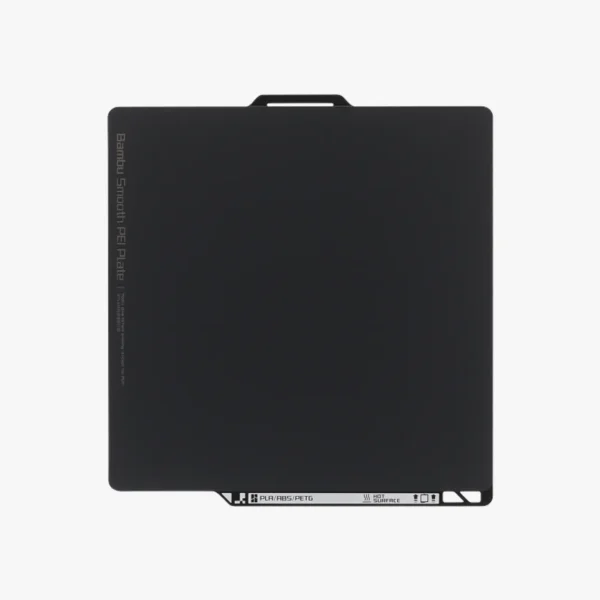 FAP032 Bambu Smooth PEI Flexible Build Plate for P2S showing flat black smooth PEI surface with handle tab and PLA ABS PETG label