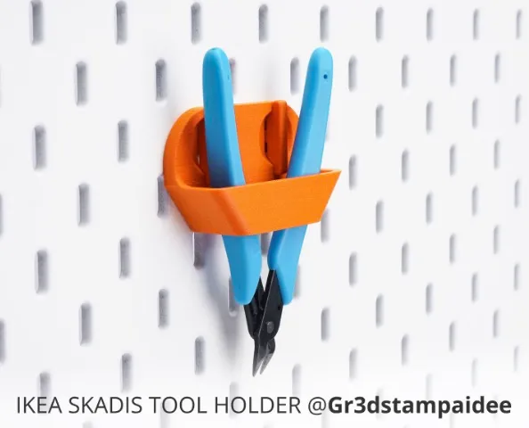 orange tool holder mounted on IKEA Skadis pegboard holding small tools 3D printed with Bambu Lab ABS-GF filament