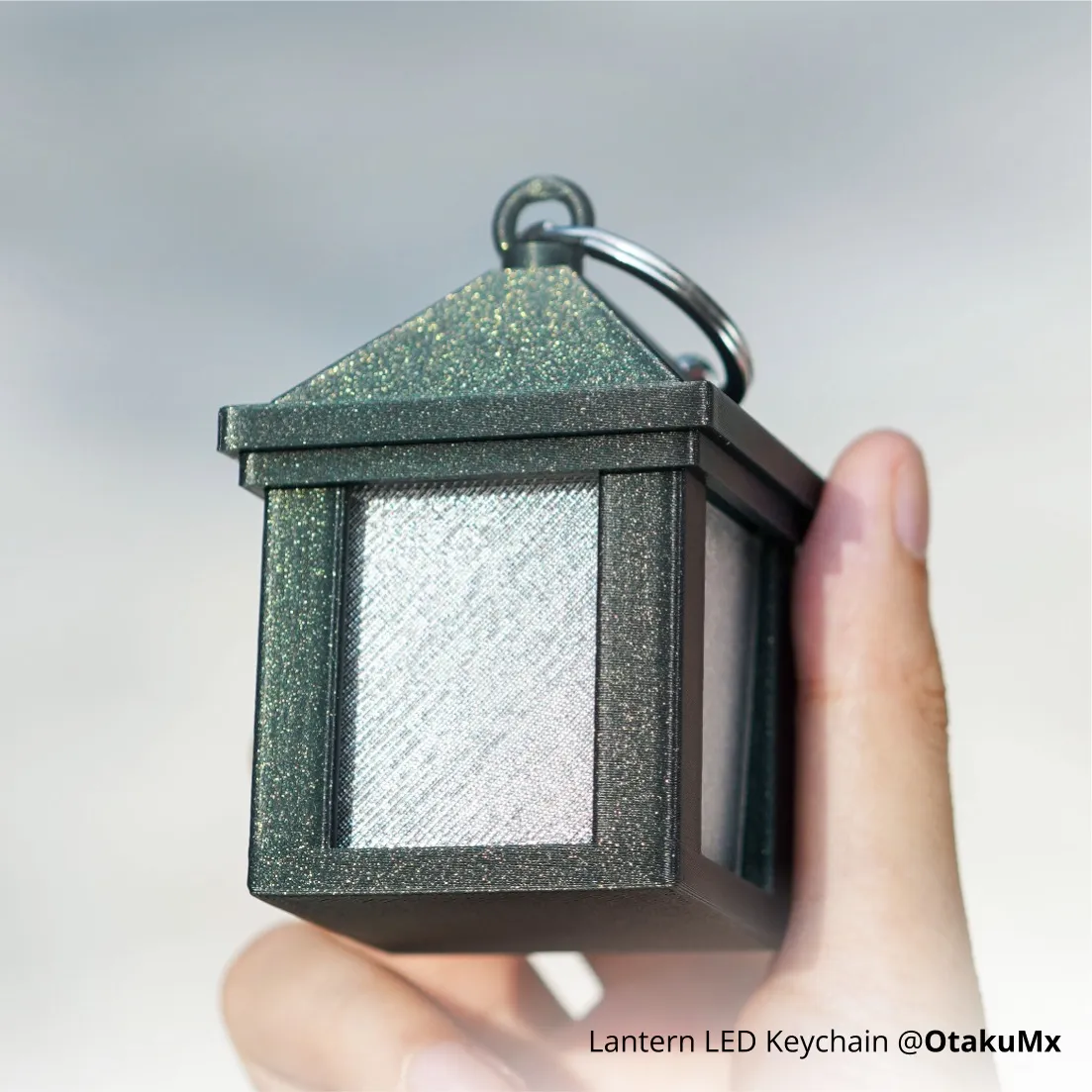 Lantern LED keychain 3D printed using Bambu Lab PLA Galaxy Filament with green glitter galaxy texture