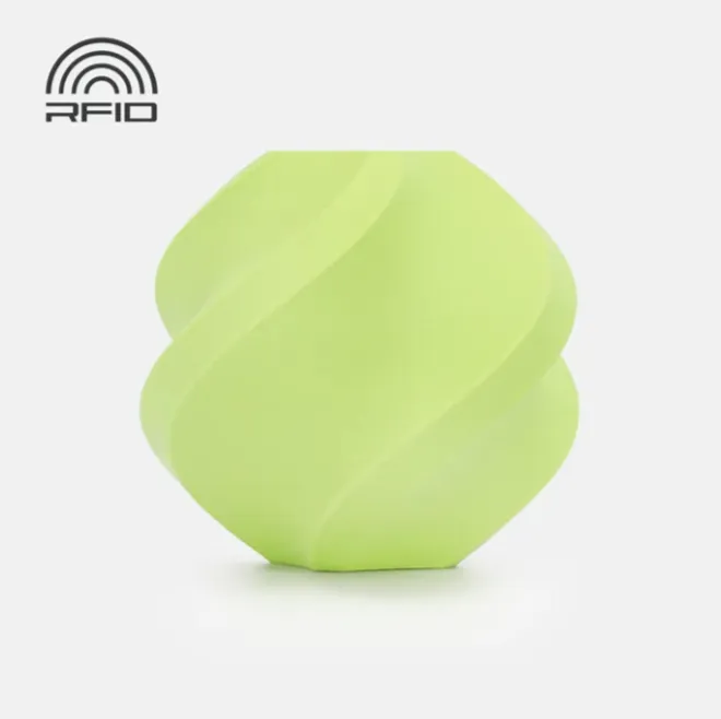 Spiral geometric 3D printed sample in matte apple green with smooth curved surface and soft layer texture