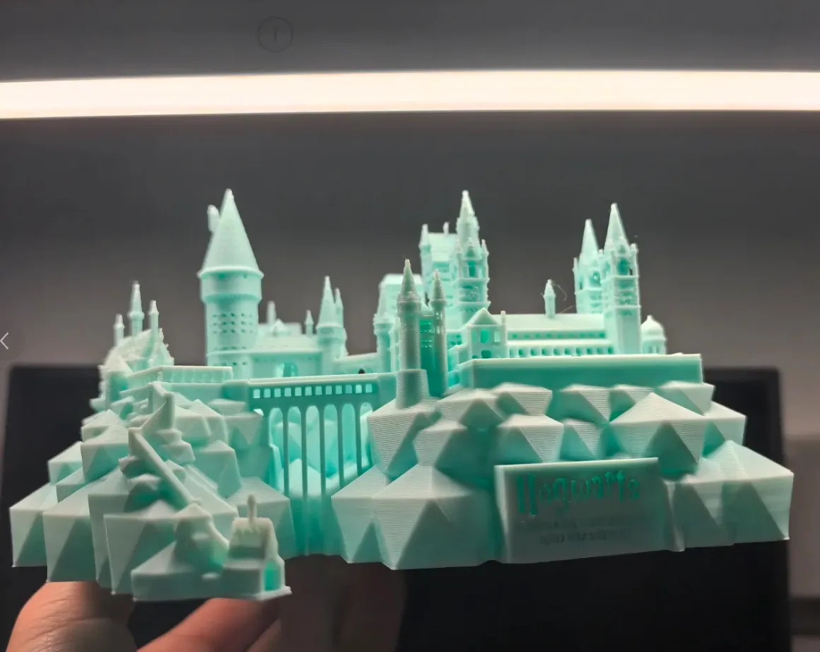 Detailed miniature castle 3D printed using Bambu Lab PLA Basic Gradient Arctic Whisper Filament with Spool Color Code 10900 showing fine architectural details