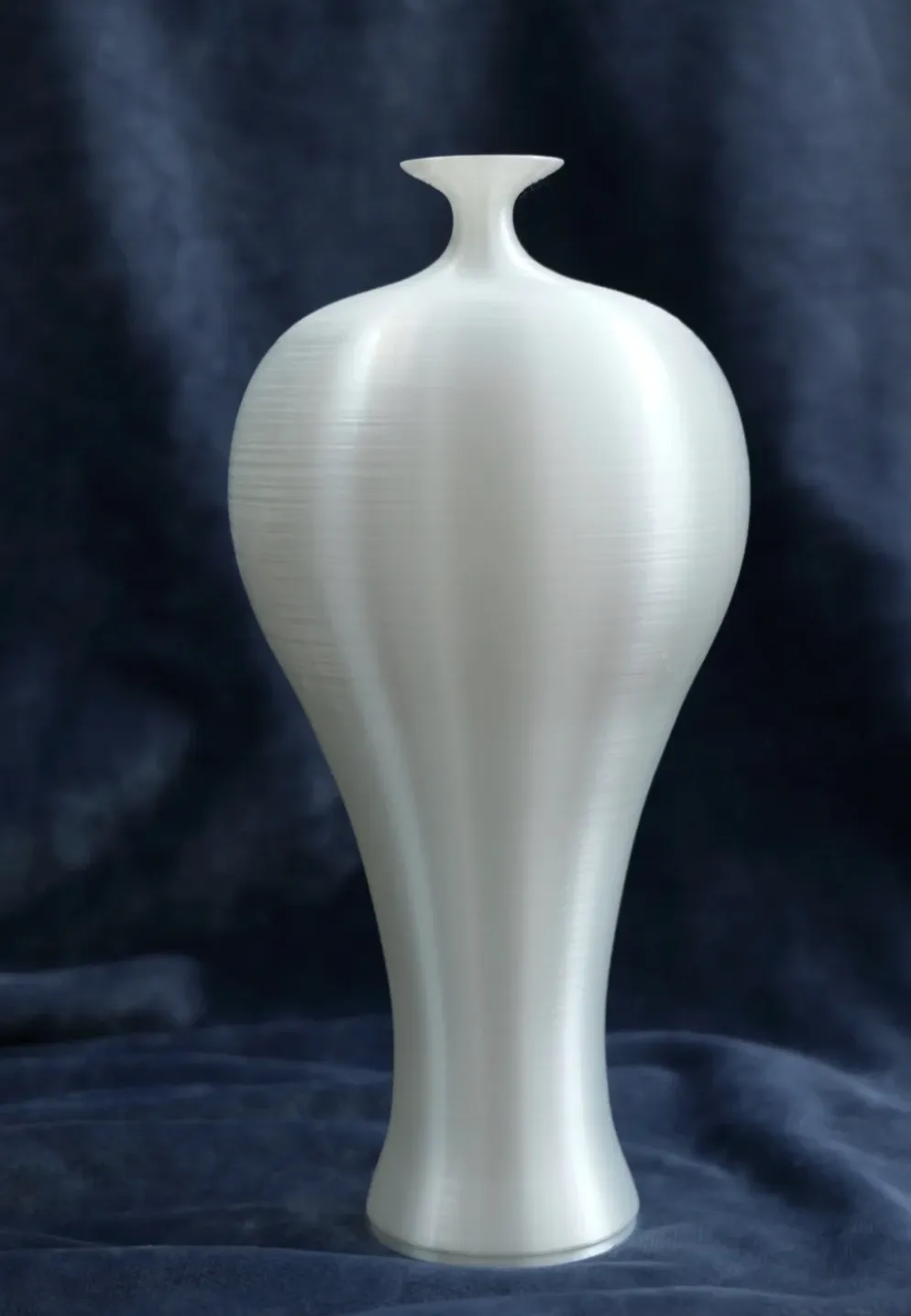 Tall minimalist vase printed with Bambu Lab PLA Silk+ White Filament 1.75mm 1kg/Spool Color Code 13110 showing smooth silk white surface