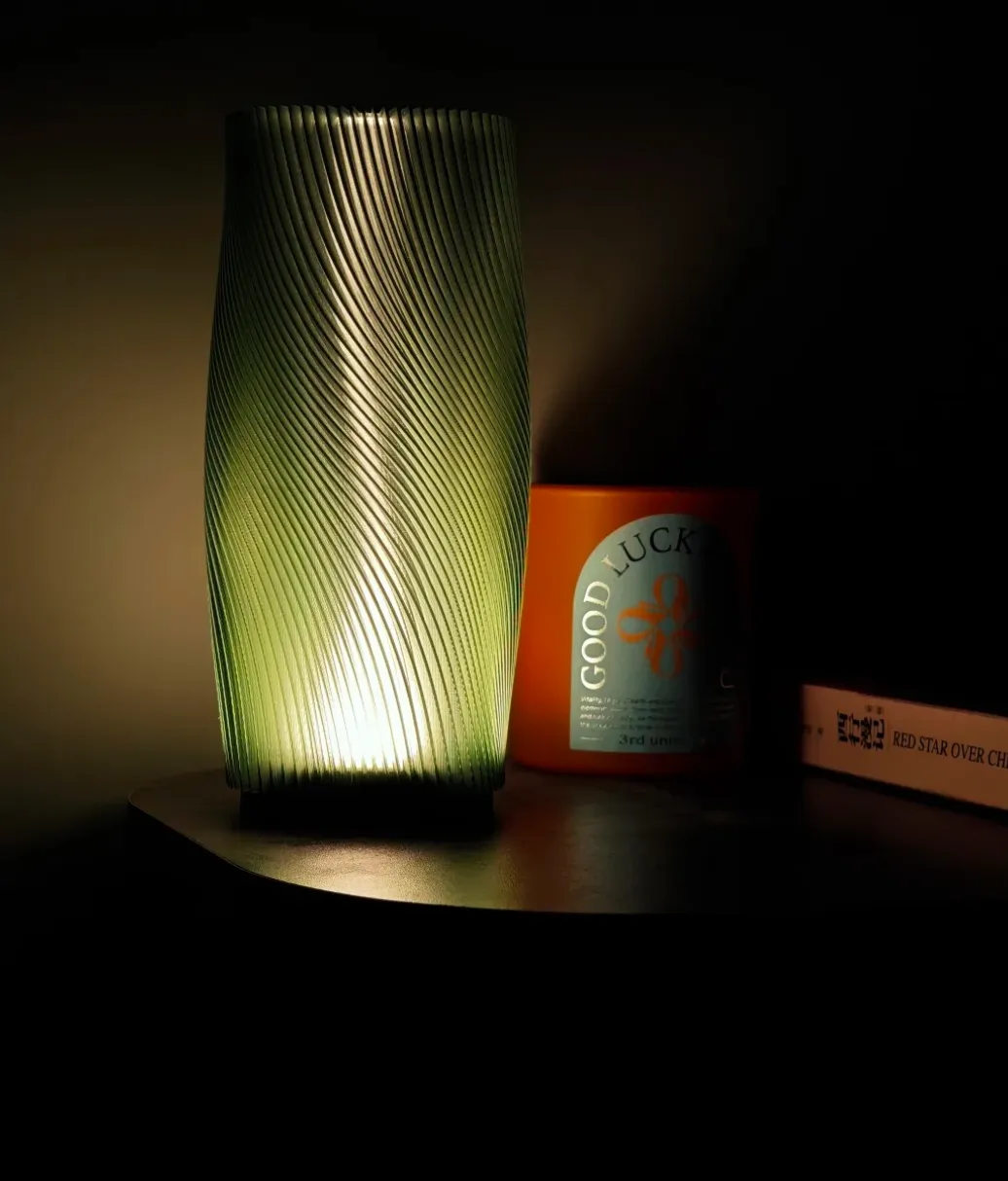 Lamp glowing in dark environment printed with Bambu Lab PETG Translucent Olive Green Filament Color Code 32500.