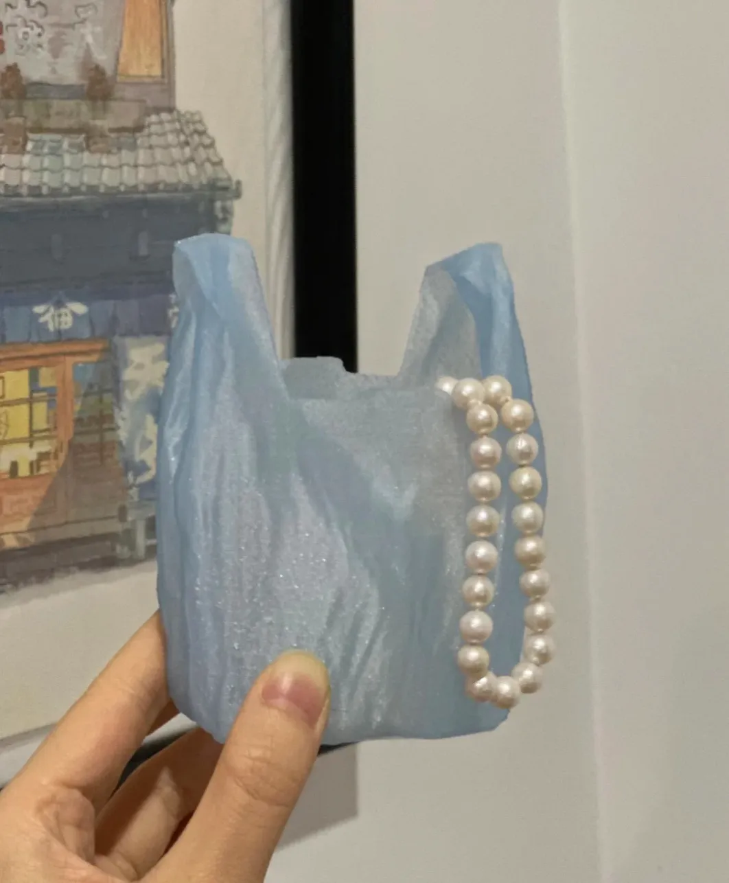 Handheld decorative container printed using Bambu Lab PLA Translucent Ice Blue Filament with Spool 13610 featuring a soft frosted translucent texture.