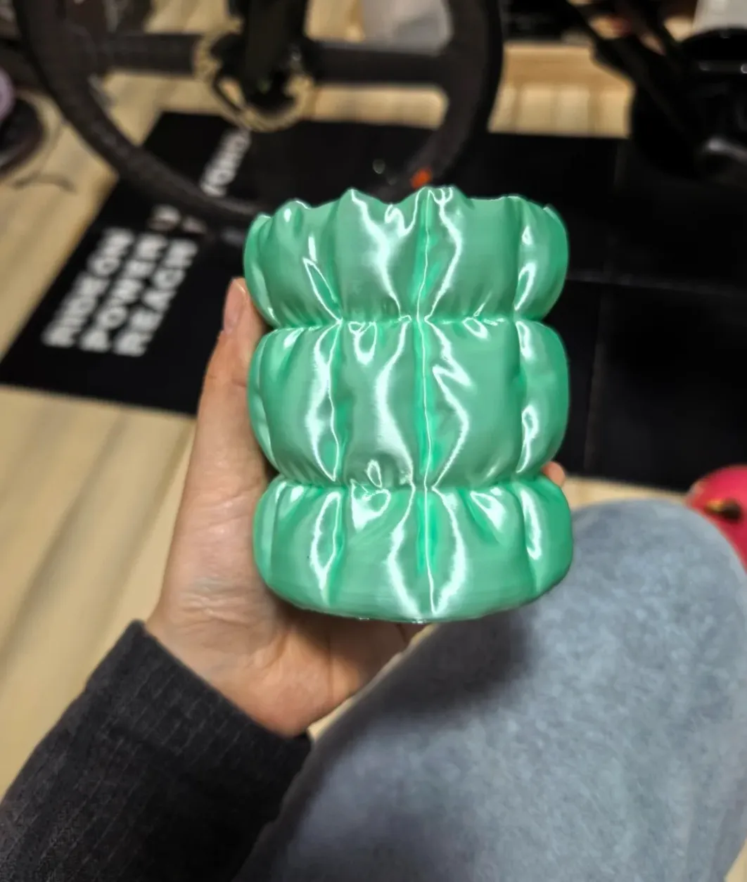 Handheld sculptural vase printed with Bambu Lab PLA Silk+ Mint Green Filament 1.75mm 1kg/Spool Color Code 13507 showing glossy silk finish