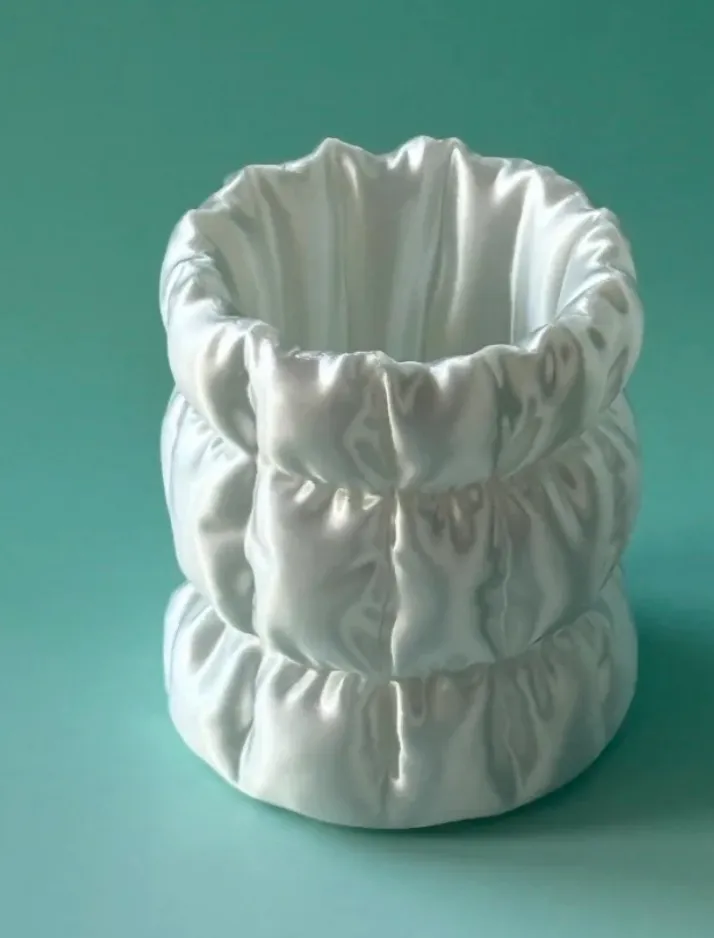 Soft sculptural vase printed using Bambu Lab PLA Silk+ White Filament 1.75mm 1kg/Spool Color Code 13110 showing smooth silk white finish