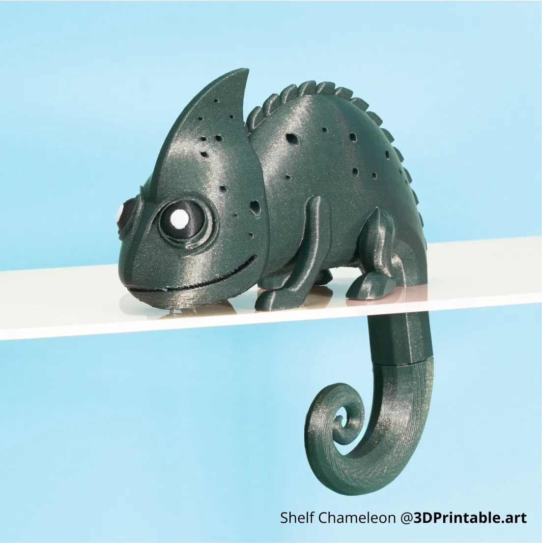 Decorative chameleon shelf model 3D printed using Bambu Lab PLA Galaxy Filament with shimmering green galaxy finish
