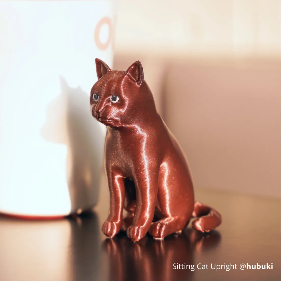 Decorative sitting cat figurine 3D printed with Bambu Lab PLA Galaxy Filament featuring metallic galaxy sparkle finish