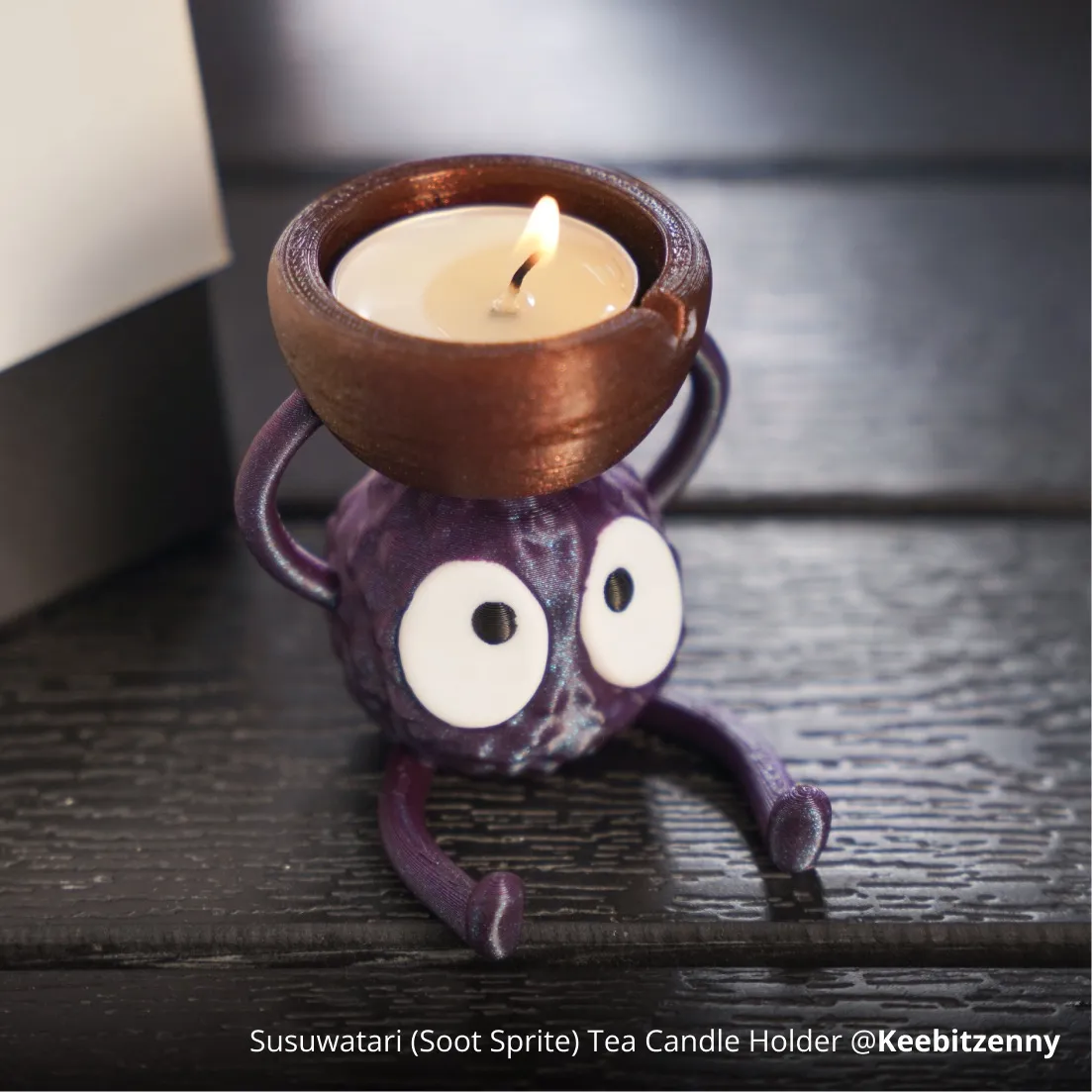 Susuwatari soot sprite candle holder 3D printed using Bambu Lab PLA Galaxy Filament with purple galaxy shimmer