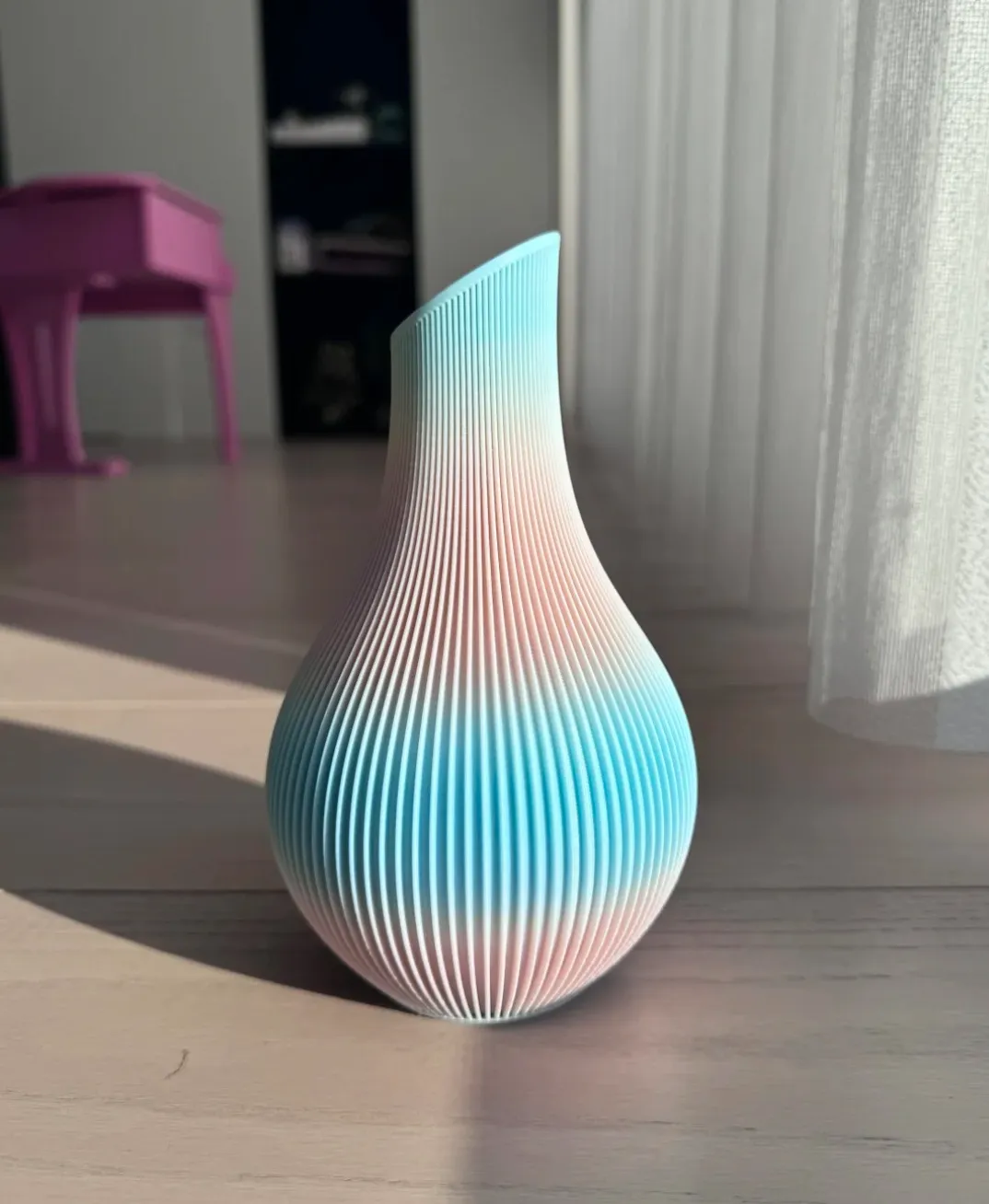tall ribbed vase with pink blue gradient printed using Bambu Lab PLA Basic Gradient Cotton Candy Cloud filament