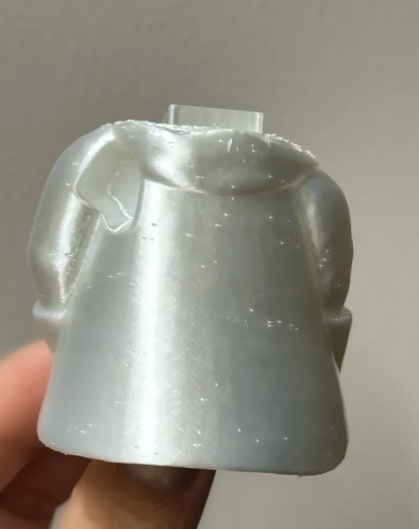 3D printed PLA model surface showing small bubbles and rough texture due to undried filament