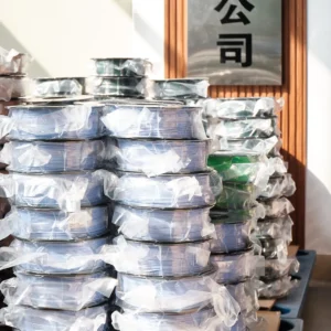 stacked 3d printing filament spools vacuum sealed light blue green bulk filament storage warehouse