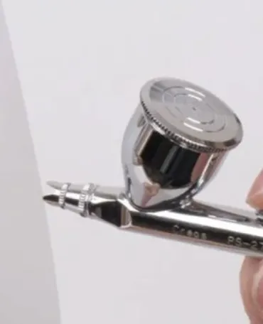 metal airbrush spray tool close-up for painting 3D prints and PLA models