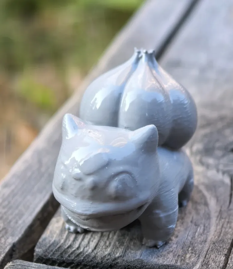 PLA 3D printed model with glossy spray paint finish showing reflective surface