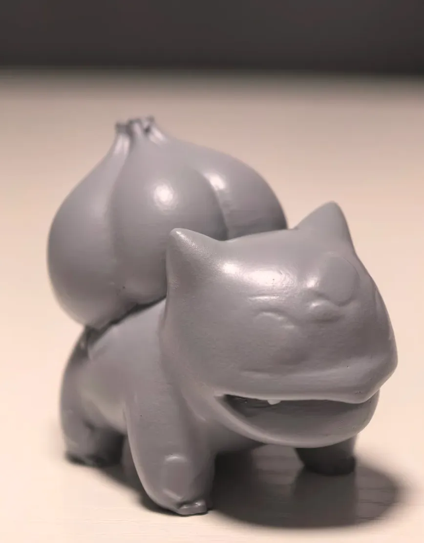 PLA 3D printed model coated with gray primer showing smooth surface finish